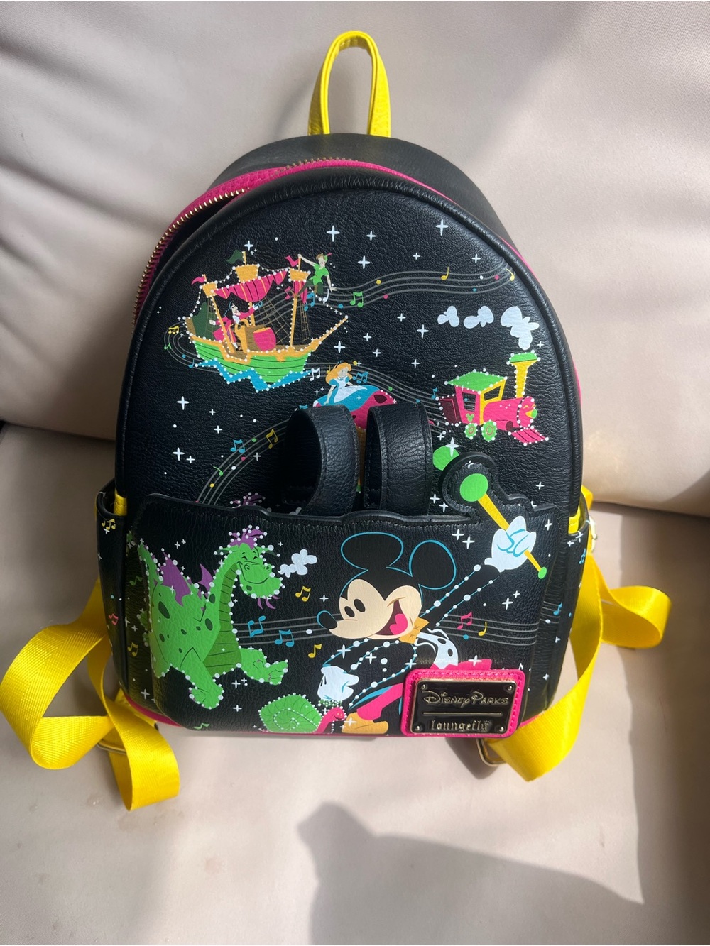 Disney Black Mini Backpack with Yellow Straps and Colorful Mickey Fantasy Print